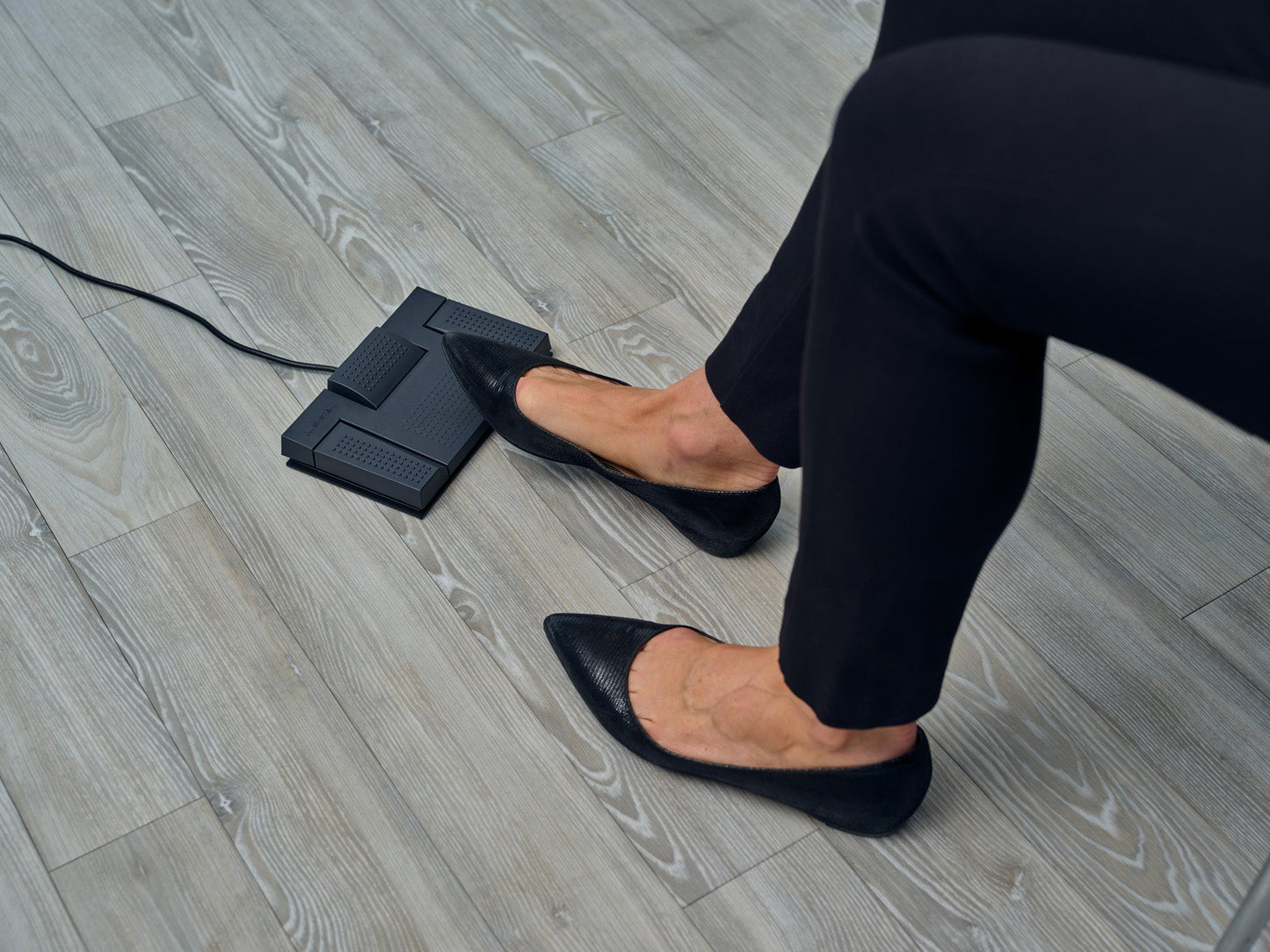 OM System RS-28N transcription foot pedal in use