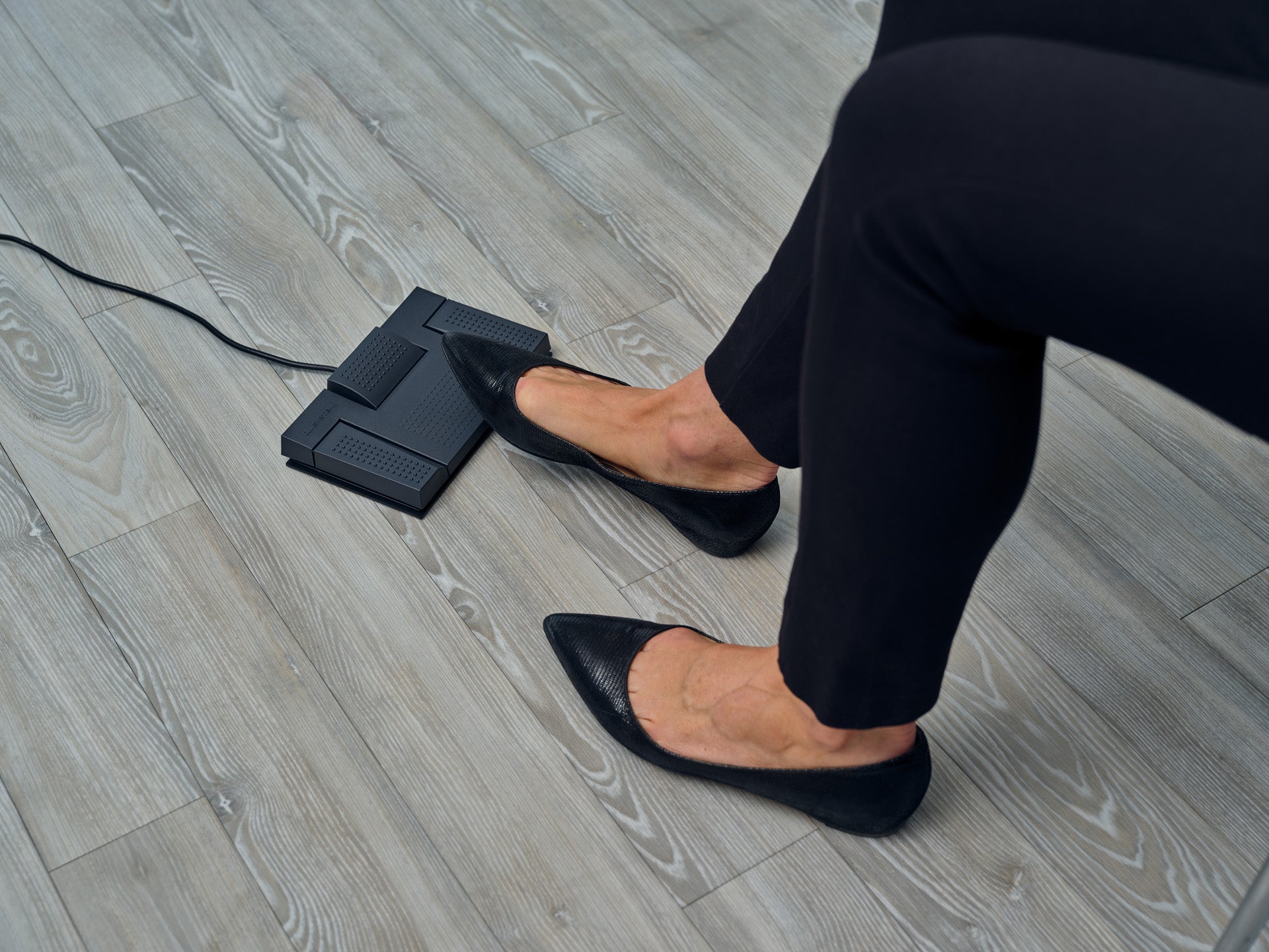 OM System RS-28N transcription foot pedal in use